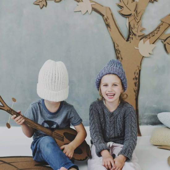 autistic twins playing on the floor